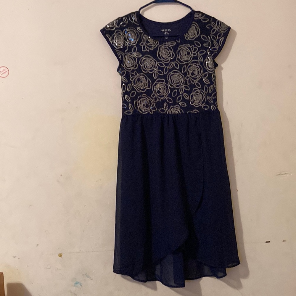 It is a blue and sliver dress also I forgot the original price